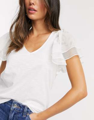 white shirt with frill sleeves