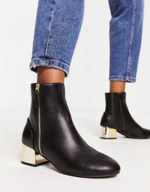 River Island side zip ankle boot in black | ASOS