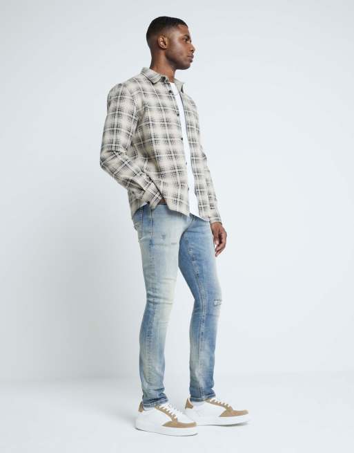 River Island Skinny fit ripped jeans in blue - medium