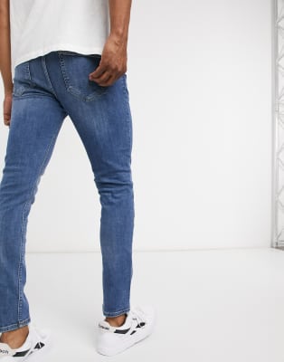 mid blue skinny jeans mens