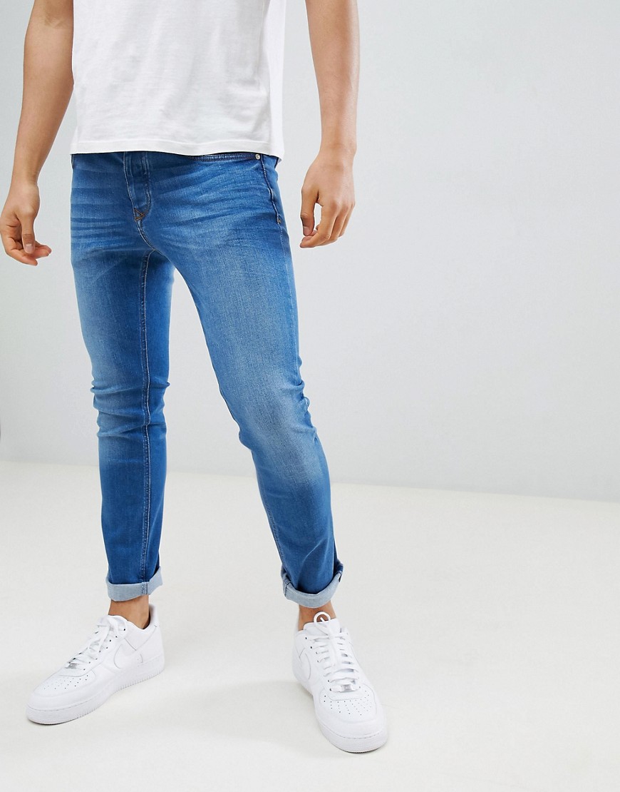 River Island skinny jeans in mid wash blue-Blues
