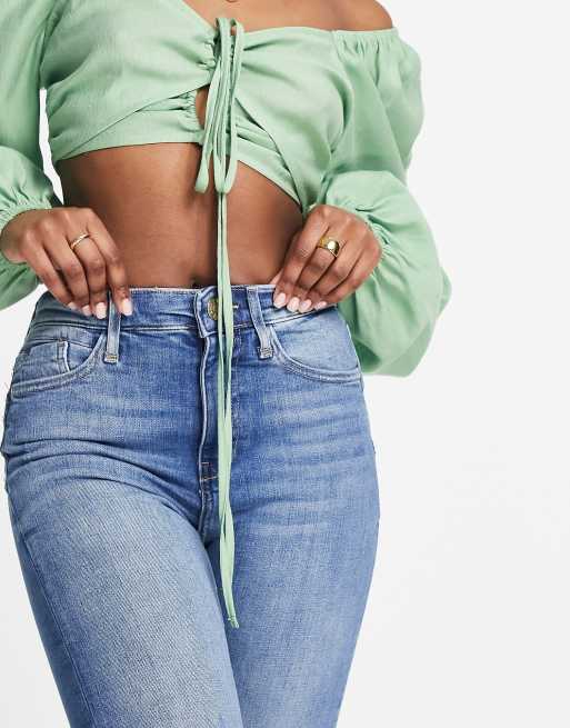 River Island - Skinny jeans met hoge taille en scheuren in middenblauw, 3 van 4