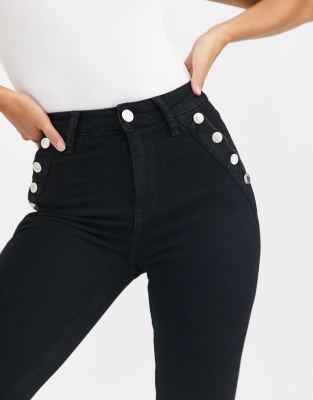 black jeans with buttons