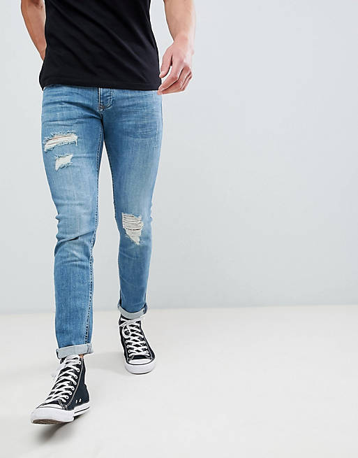 River Island skinny jeans with rips in mid wash | ASOS