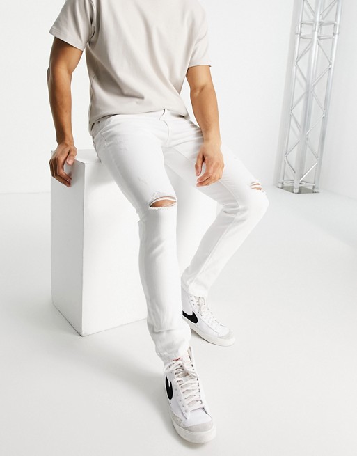 River Island skinny jeans with rips in white