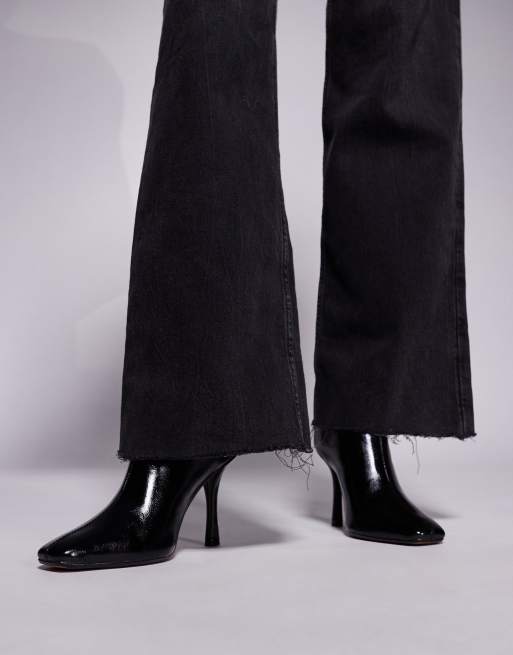 River Island slanted clean heeled boots in black