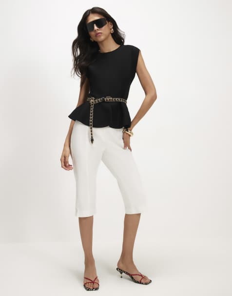 River Island Sleeveless knit peplum top in black - view 1
