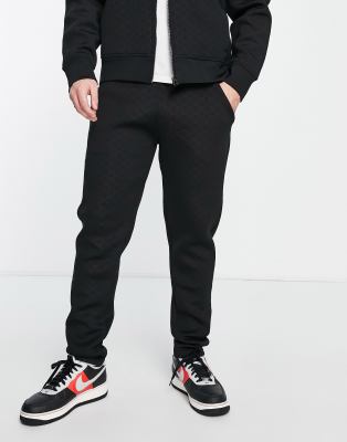 River Island slim embossed co-ord  joggers in black - ASOS Price Checker