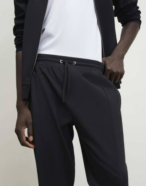 River Island Slim fit cotton pintuck joggers in black, 2 of 4