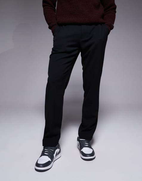 River Island slim fit decal trackies in black - view 1