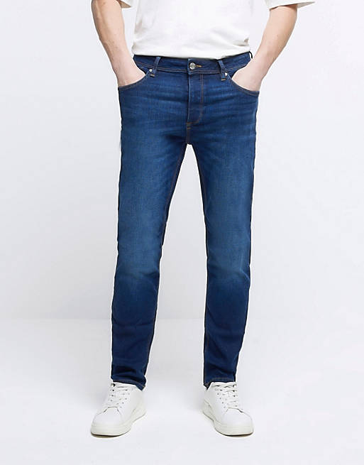 River Island slim fit jeans in dark blue | ASOS