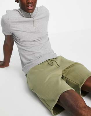 River Island slim fit jersey shorts in khaki-Green