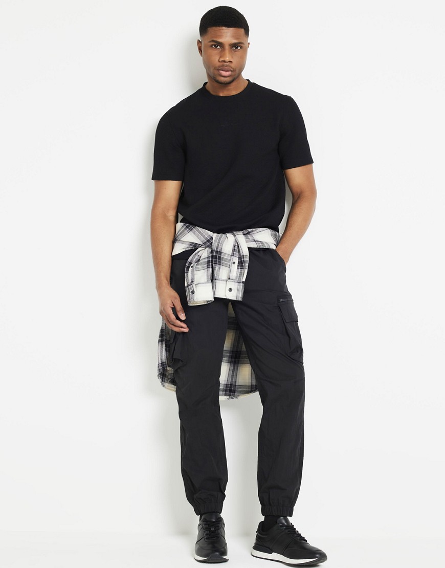 River Island Slim fit quilted t-shirt in black