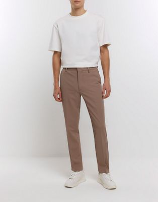 River Island Slim fit waffle textured trousers in beige - ASOS Price Checker