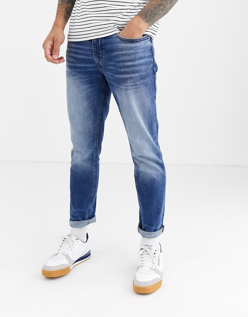 River Island slim jeans in mid wash blue-Blues
