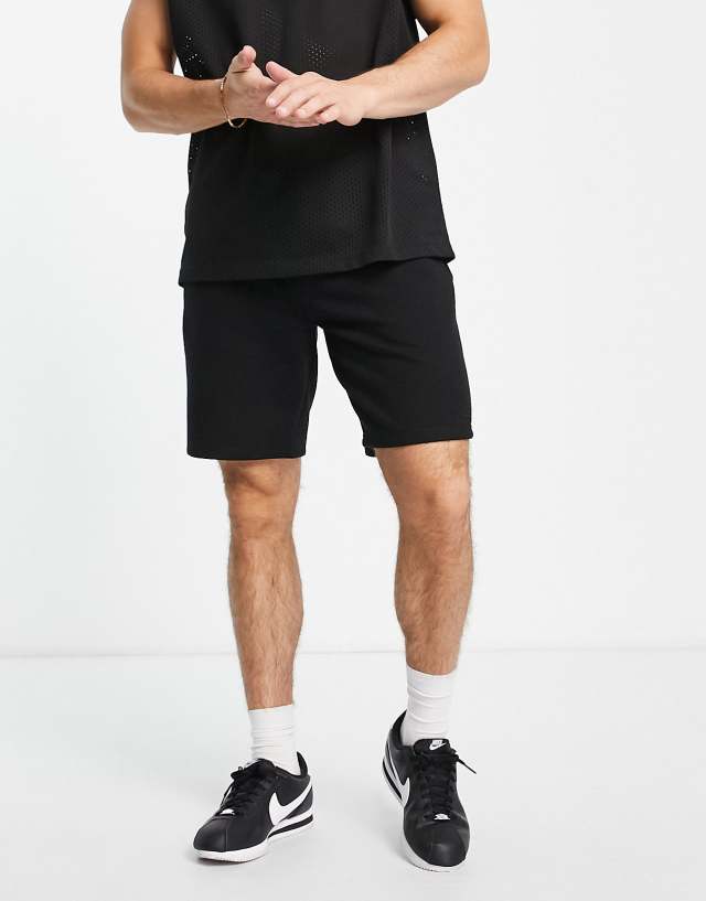 River Island slim jersey shorts in black