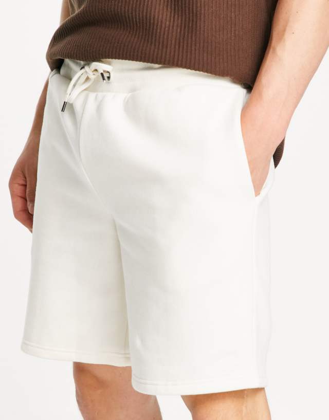 River Island slim jersey shorts in ecru