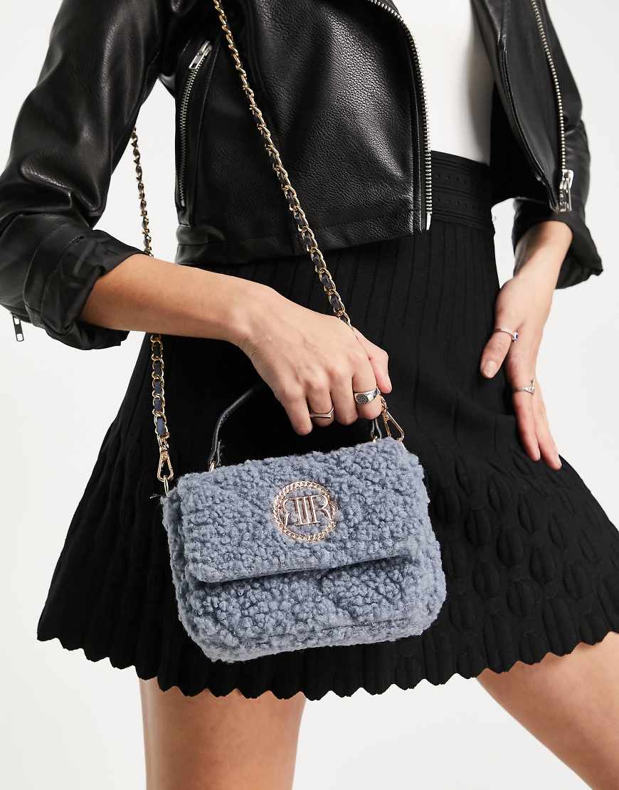 River Island small quilted teddy cross body bag in blue-Blues