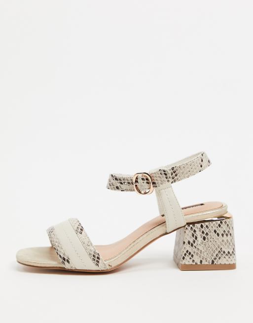 snakeskin square toe heels