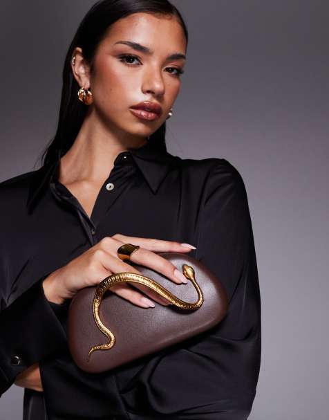 River Island snake hardware hard shell clutch bag in brown - view 1