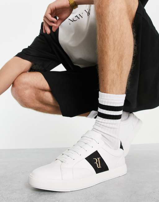 River Island - Sneakers bianche con logo