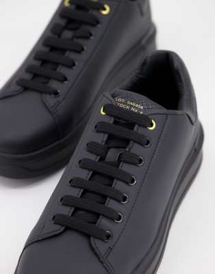 River Island - Sneakers met dikke zool in zwart | ASOS