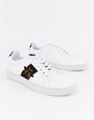 white sneakers with embroidery