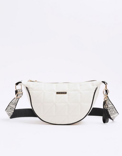 River Island Soft quilted cross body bag in cream