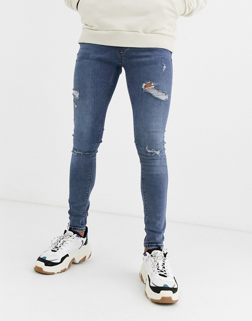 River Island spray on jeans in blue grey with abrasions