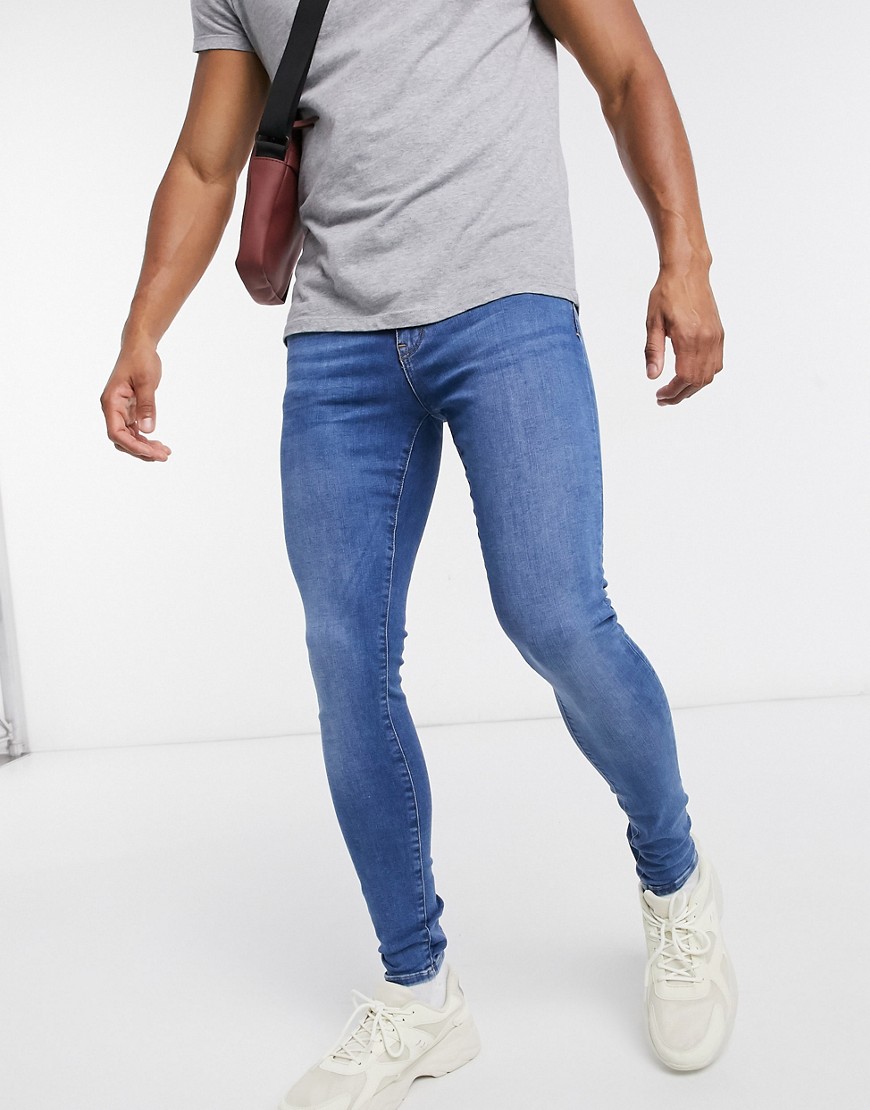 River Island spray on jeans in mid blue wash-Blues
