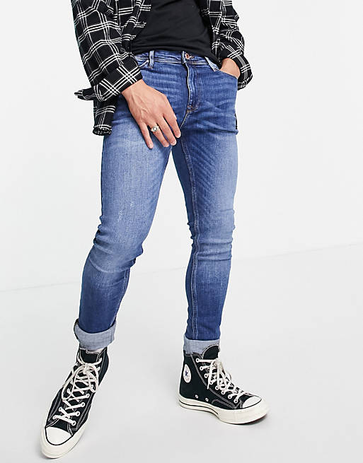 River Island spray on jeans in mid blue