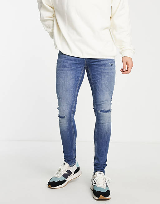 River Island spray on jeans with rips in medium blue