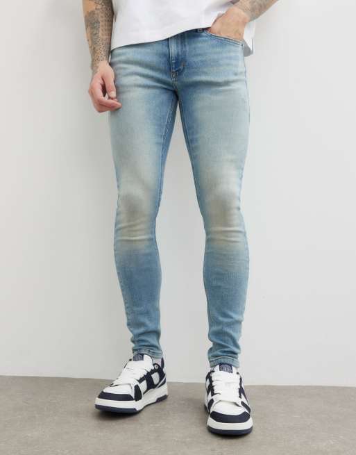 River Island Spray on skinny jeans in blue - light