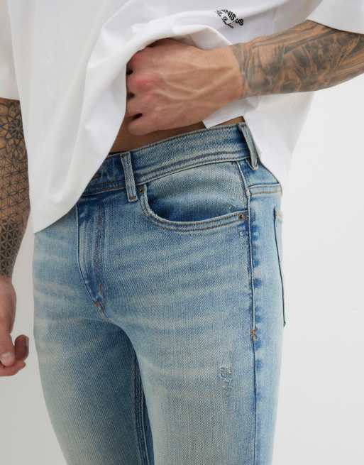 River Island Spray on skinny jeans in blue - light