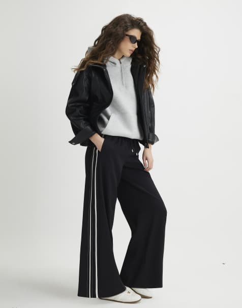 River Island Stitch side stripe joggers in black - view 1