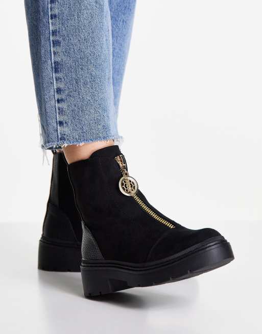 River Island - Stivaletti neri con suola spessa e zip sul davanti