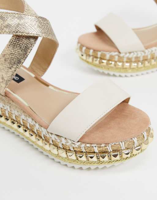 White and cheap gold flatforms