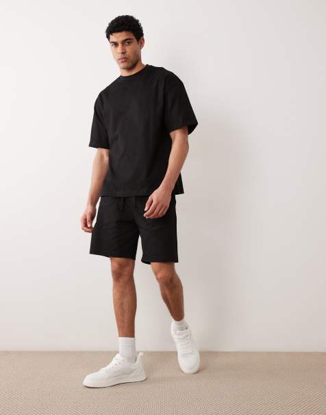 River Island – Svart set med t-shirt i oversize med boxig passform och shorts - view 1