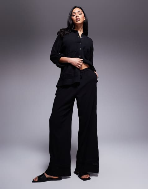 River Island – Svarta, krinklade byxor med vida ben, del av set - view 1