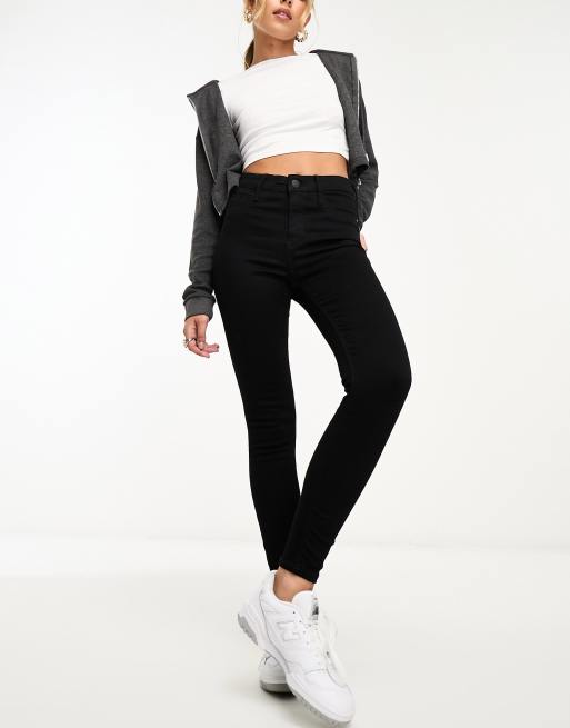 River Island – Svarta skinny jeans med medelhög midja