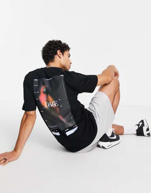 River Island - T-shirt avec imprimé Daze Macaw - Noir