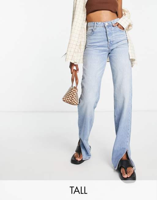 River Island Tall – Jasnoniebieskie proste jeansy w stylu lat 90. z ozdobnym wiązaniem z tyłu