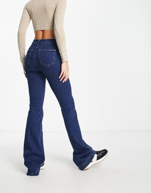 River Island Tall - Jeans a zampa a vita medio alta blu medio senza tasche