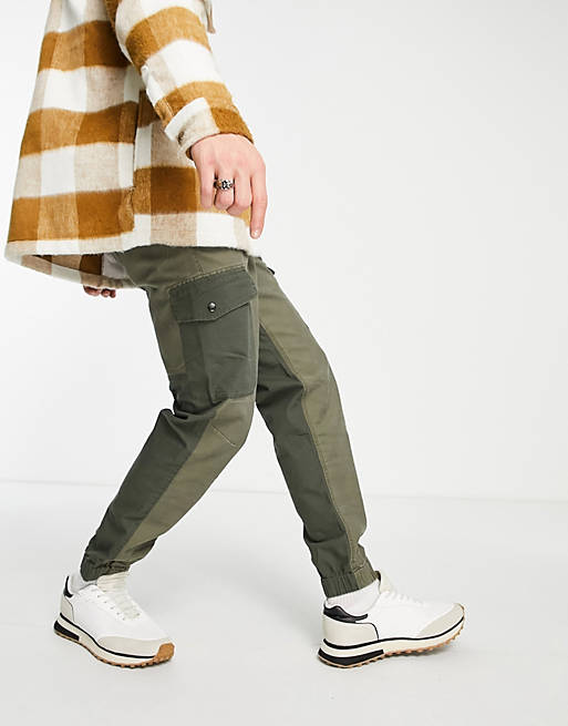 Men River Island tapered blocked cargo trousers in washed khaki 