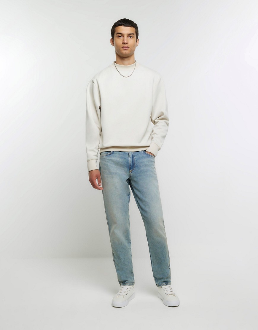 River Island Tapered fit faded jeans in blue - light
