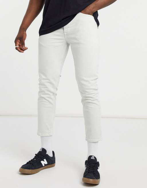 River Island tapered jeans in ecru | ASOS