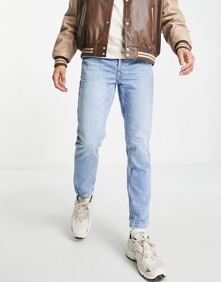 River Island tapered jeans in mid blue - ASOS Price Checker