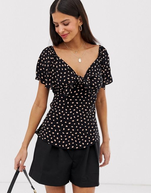 River Island tie front blouse in polka dot print | ASOS