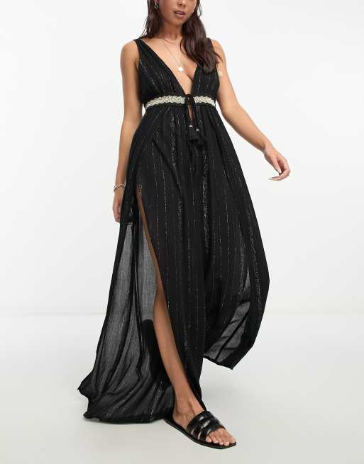 River Island – Tief ausgeschnittener Strand-Jumpsuit in Schwarz mit weitem Bein