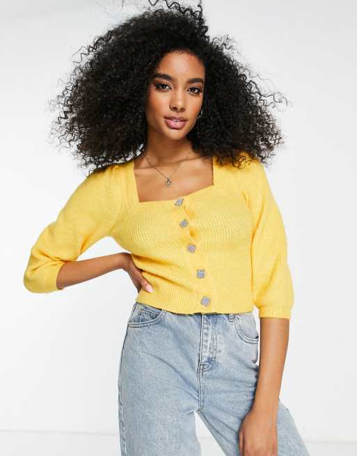 River Island - Top in maglia arancione con bottoni in strass sul davanti